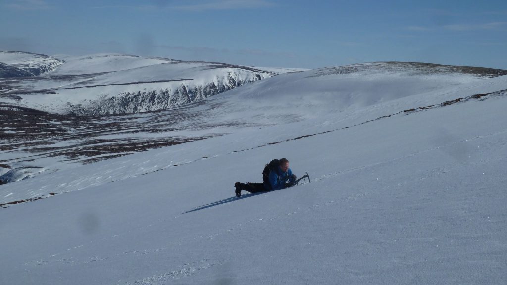 Alastair practising his ice axe skills
